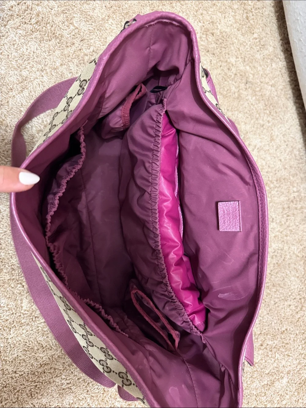 Gucci Beige Monogram Crossbody Diaper bag with Pink Trim.